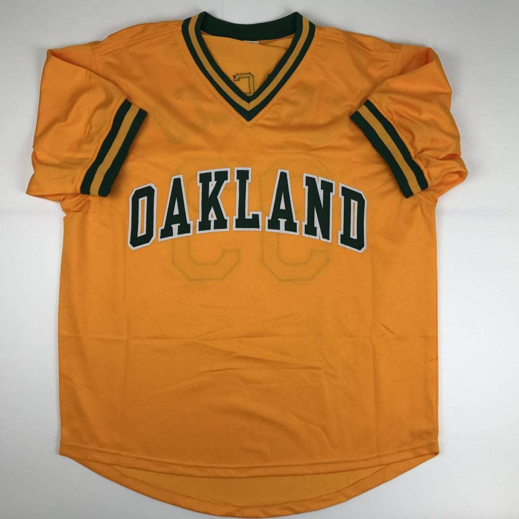 Autographed/Signed Jose Canseco Oakland Yellow Baseball Jersey Beckett BAS COA
