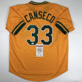 Autographed/Signed Jose Canseco Oakland Yellow Baseball Jersey Beckett BAS COA