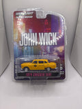 Greenlight 1974 Checker Taxi Diecast yellow