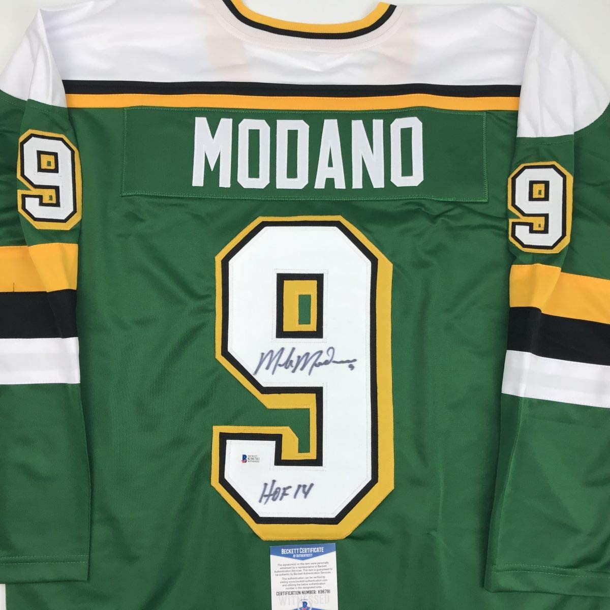 Autographed/Signed Mike Modano Minnesota Green Hockey Jersey Beckett BAS COA