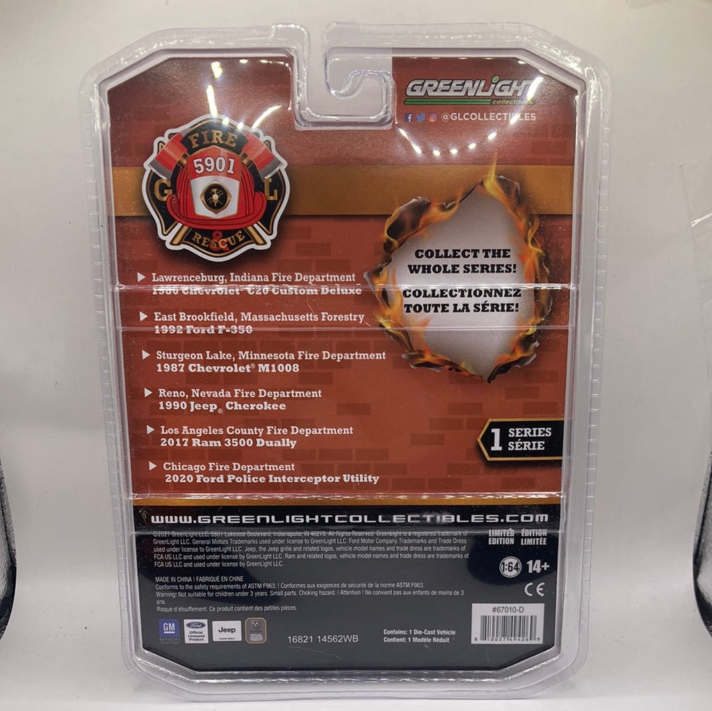Greenlight 1990 Jeep Cherokee-Reno,Nevada Fire Department Diecast red