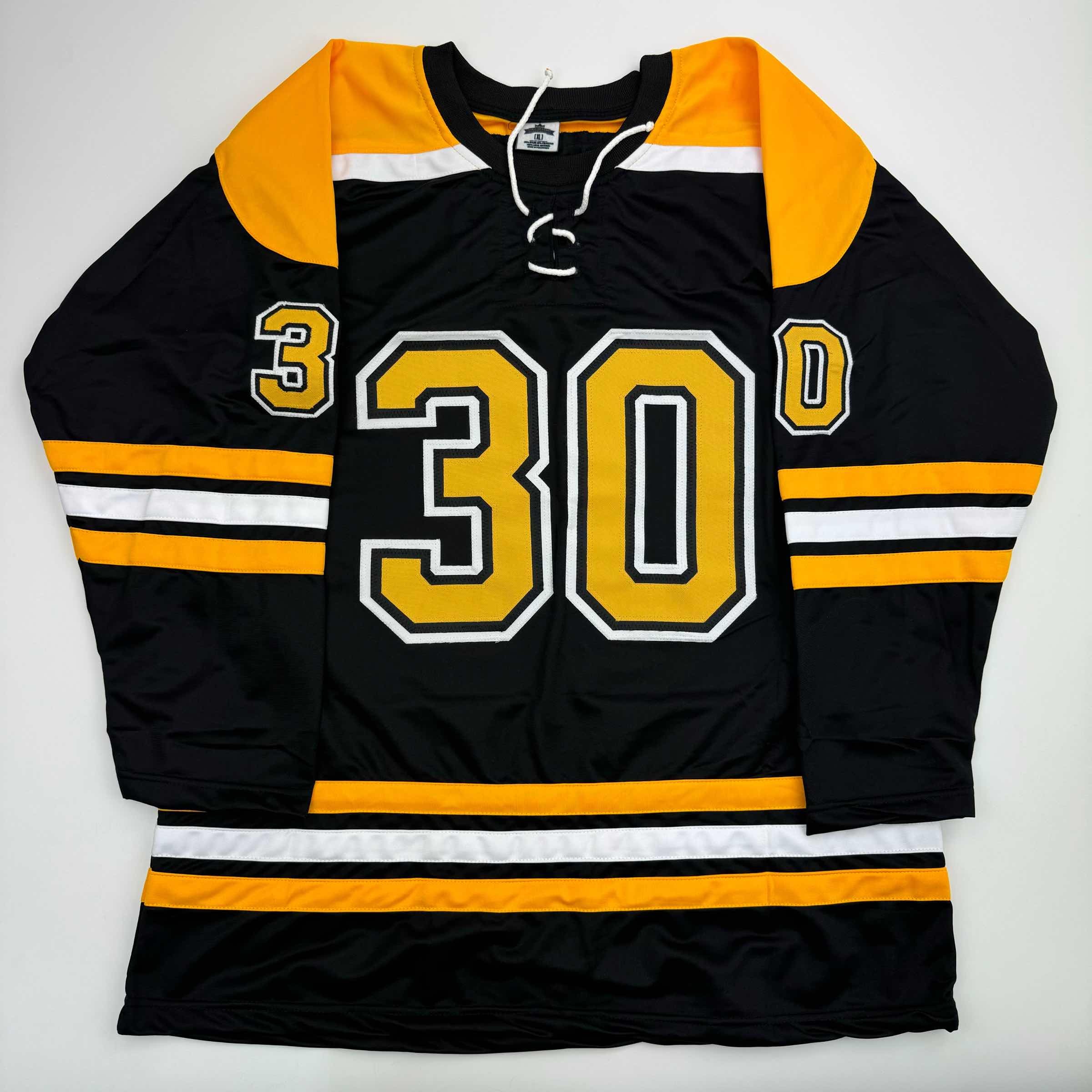 Autographed/Signed Tim Thomas Boston Black Hockey Jersey JSA COA