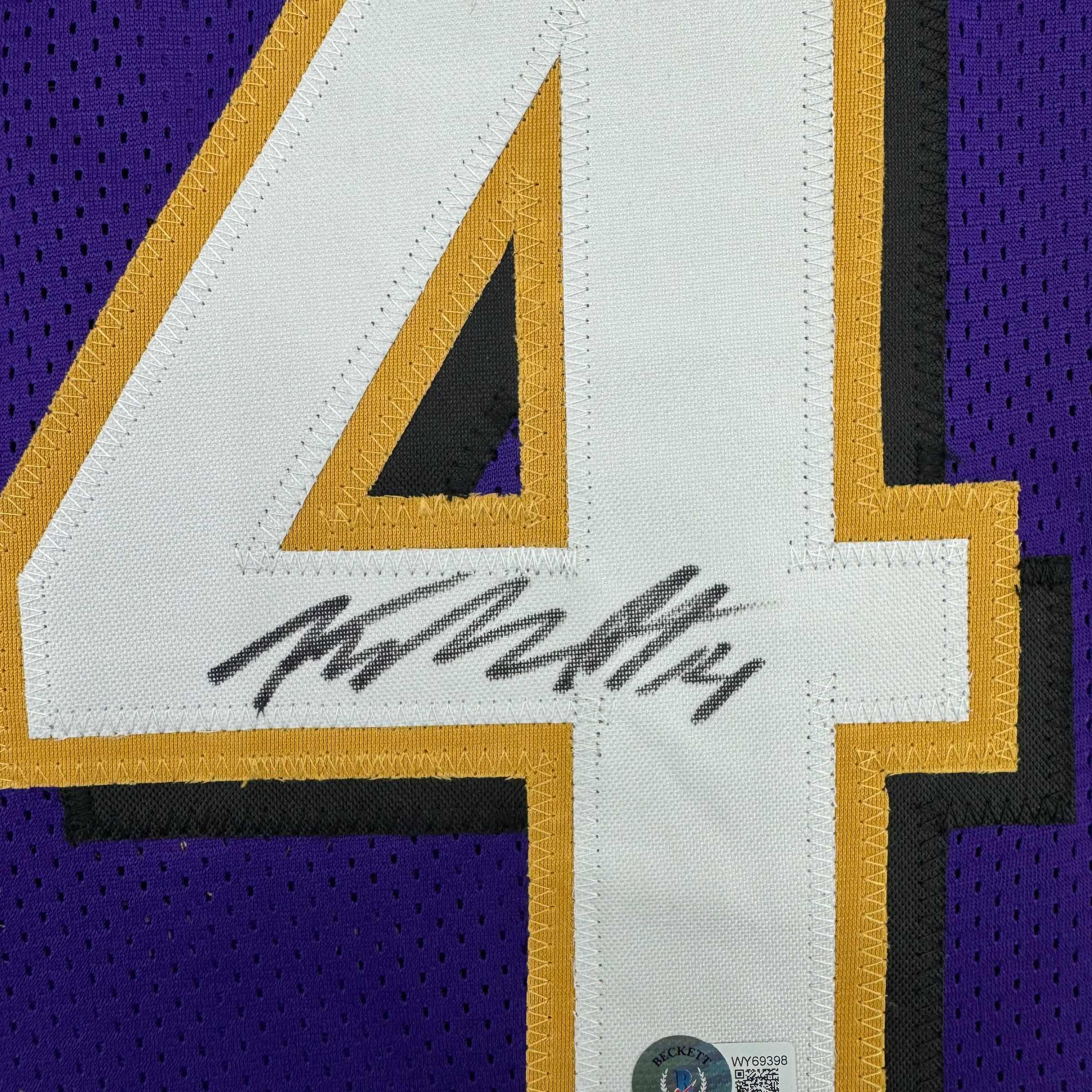 Framed Autographed/Signed Kyle Hamilton 35x39 Baltimore Purple Football Jersey Beckett BAS COA